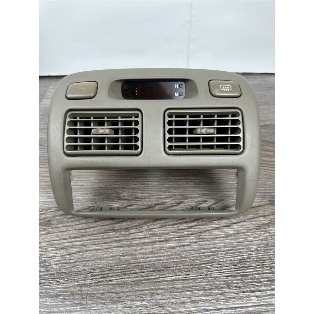 1998-2002 Toyota Corolla Center Dash Air Vents Radio Bezel Clock Trim OEM.